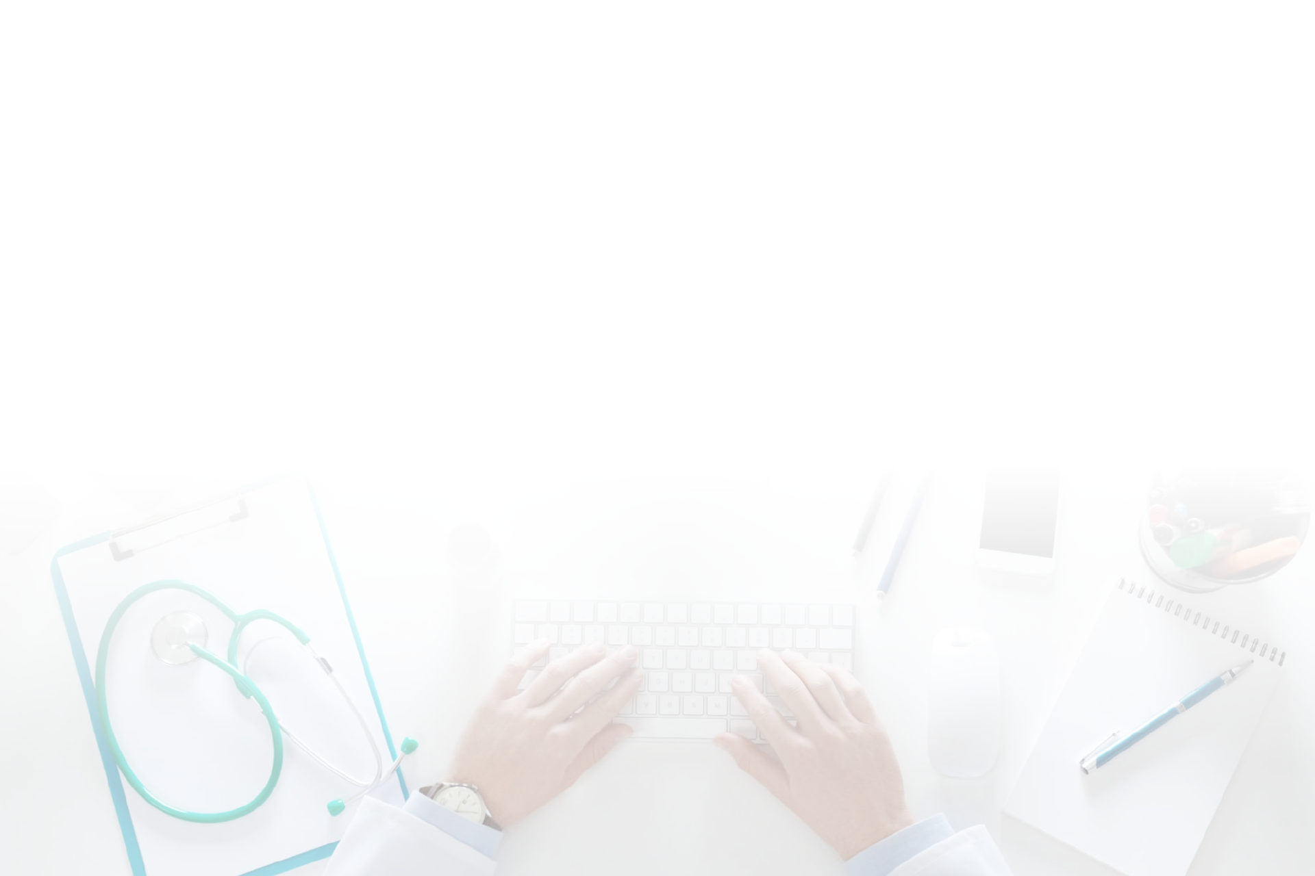 A physician using a keyboard at the office