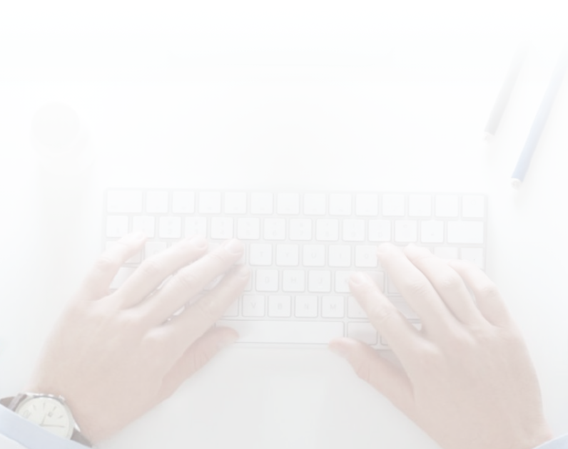 A physician using a keyboard at the office