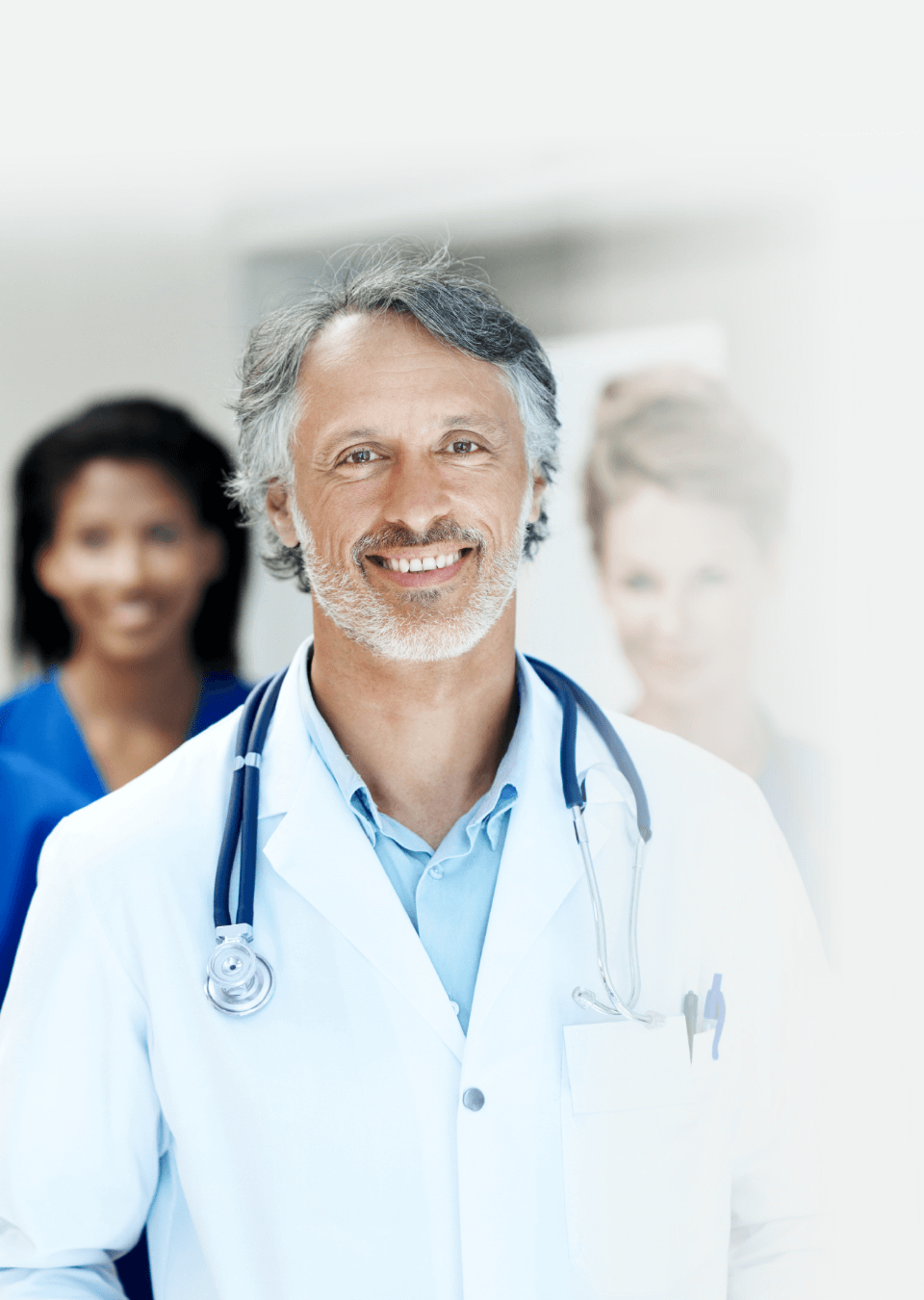 A professional male physician smiling