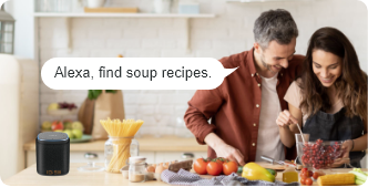 A couple using iFORA IntelliSpeaker to find soup recipes through Alexa in the kitchen